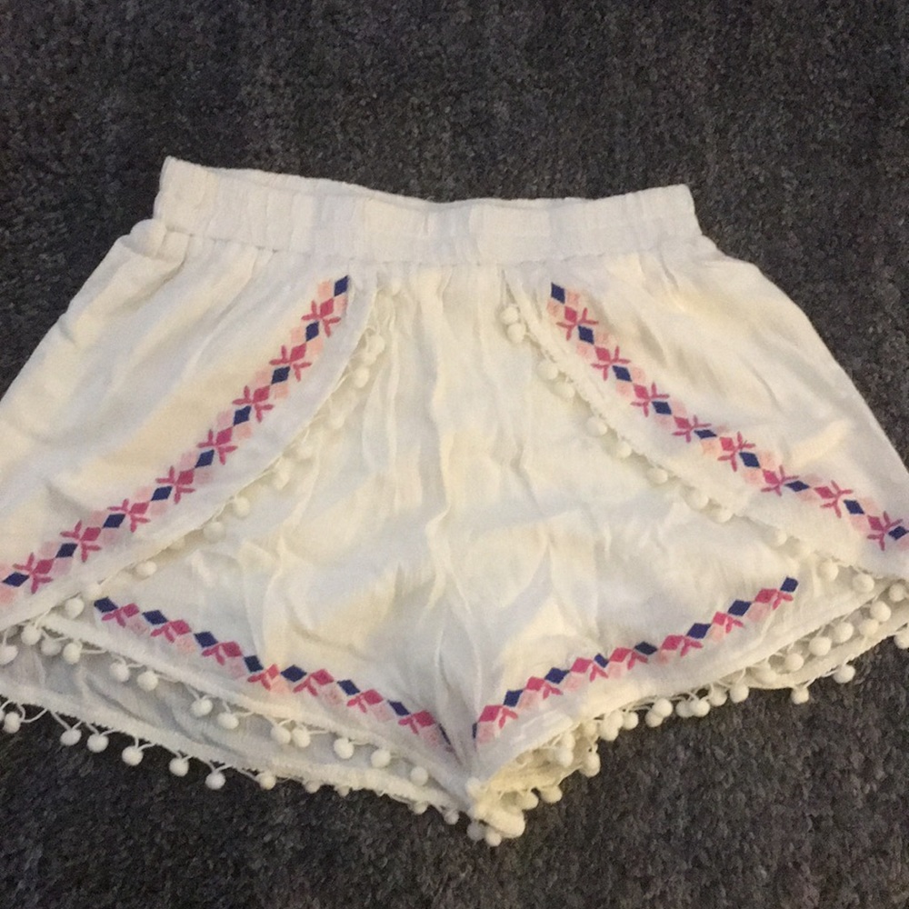 NWOT Francesca’s shorts with Pom poms